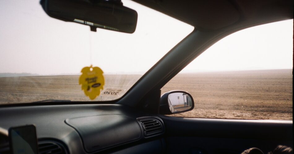 yellow car on road during daytime