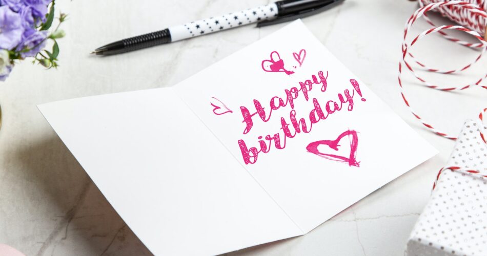 Open Birthday Greeting Card Near Pen